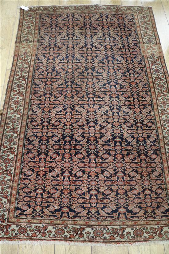An Isphahan rust and blue rug 190 x 120cm